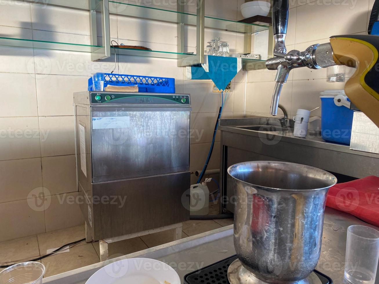 Beer faucet at bar at all inclusive hotel in touristic warm tropical country vacation paradise resort photo
