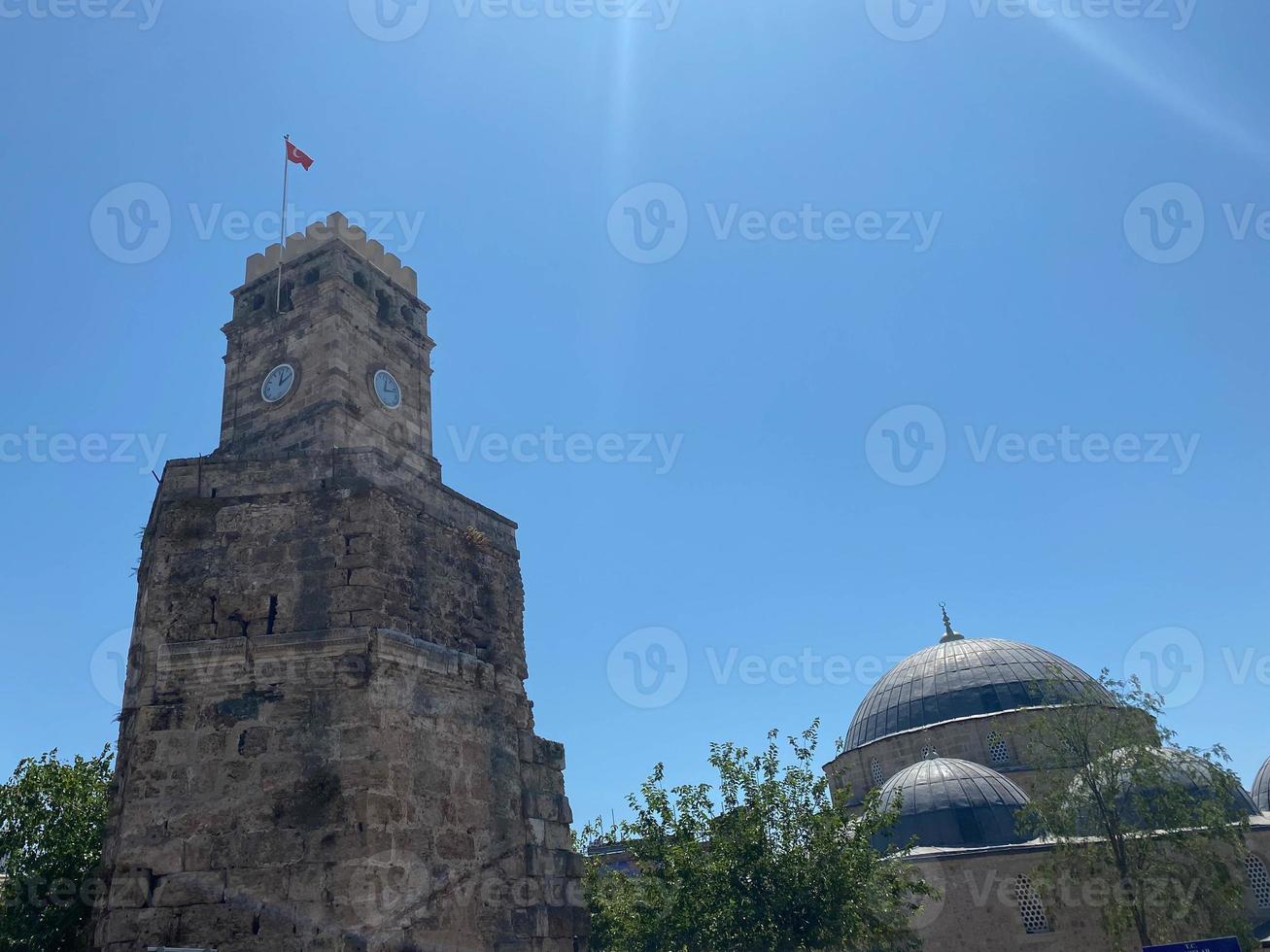 Old stone tower. Ancient stone building of old town photo