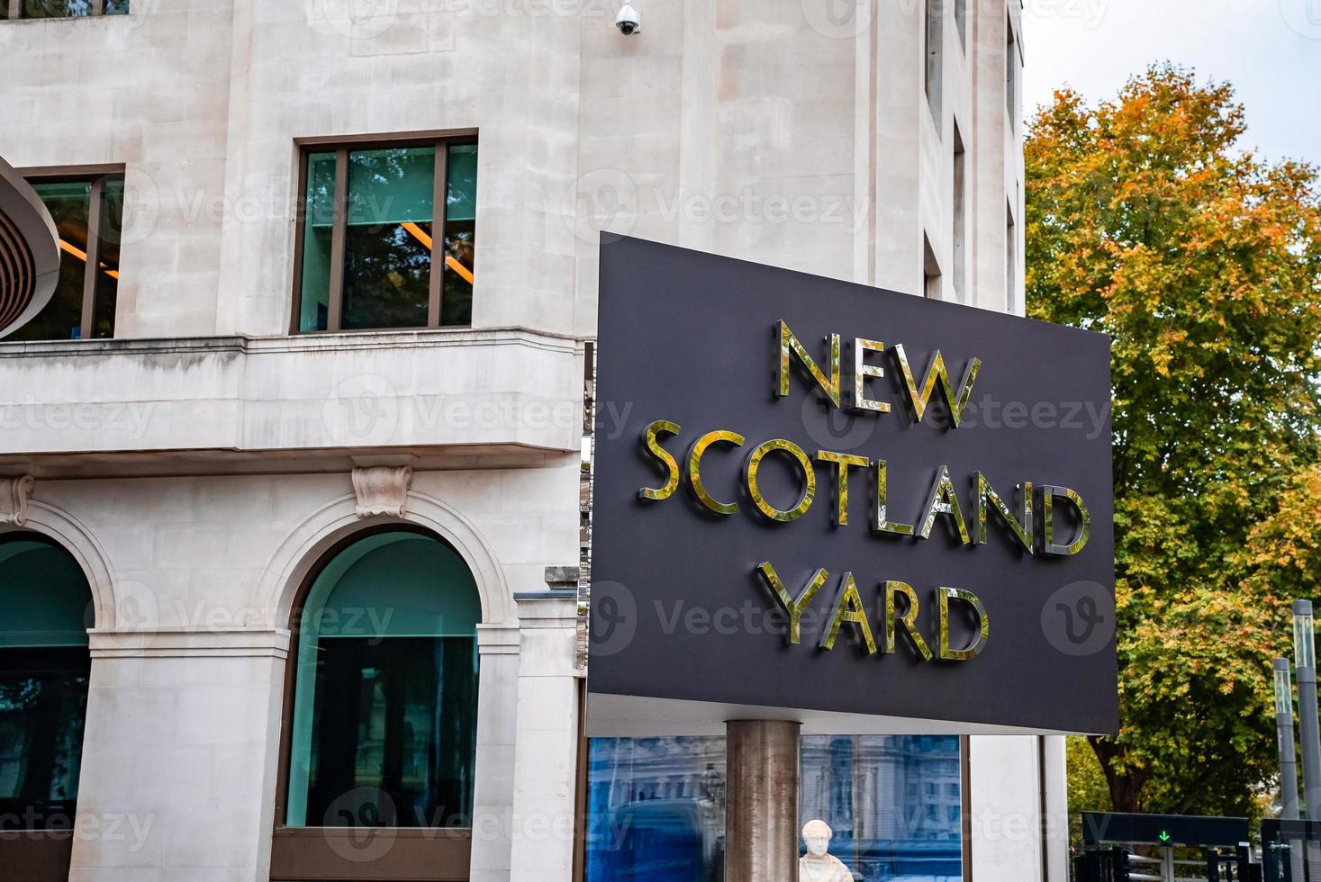 Sign outside the headquarters of London's Metropolitan Police in New Scotland Yard, Westminster. photo