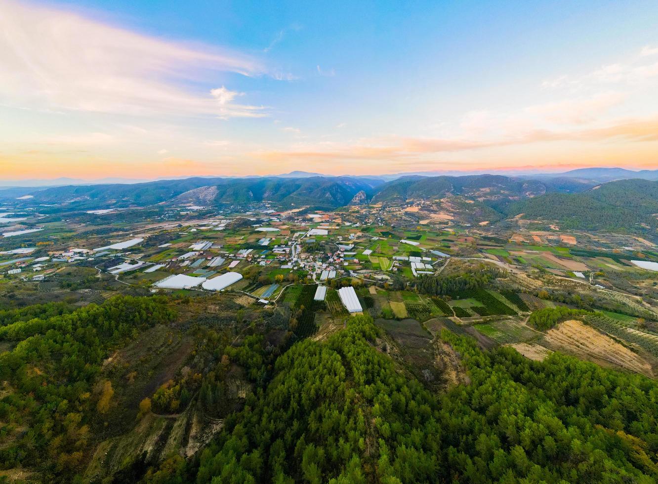 aerial view of farmland and small town photo