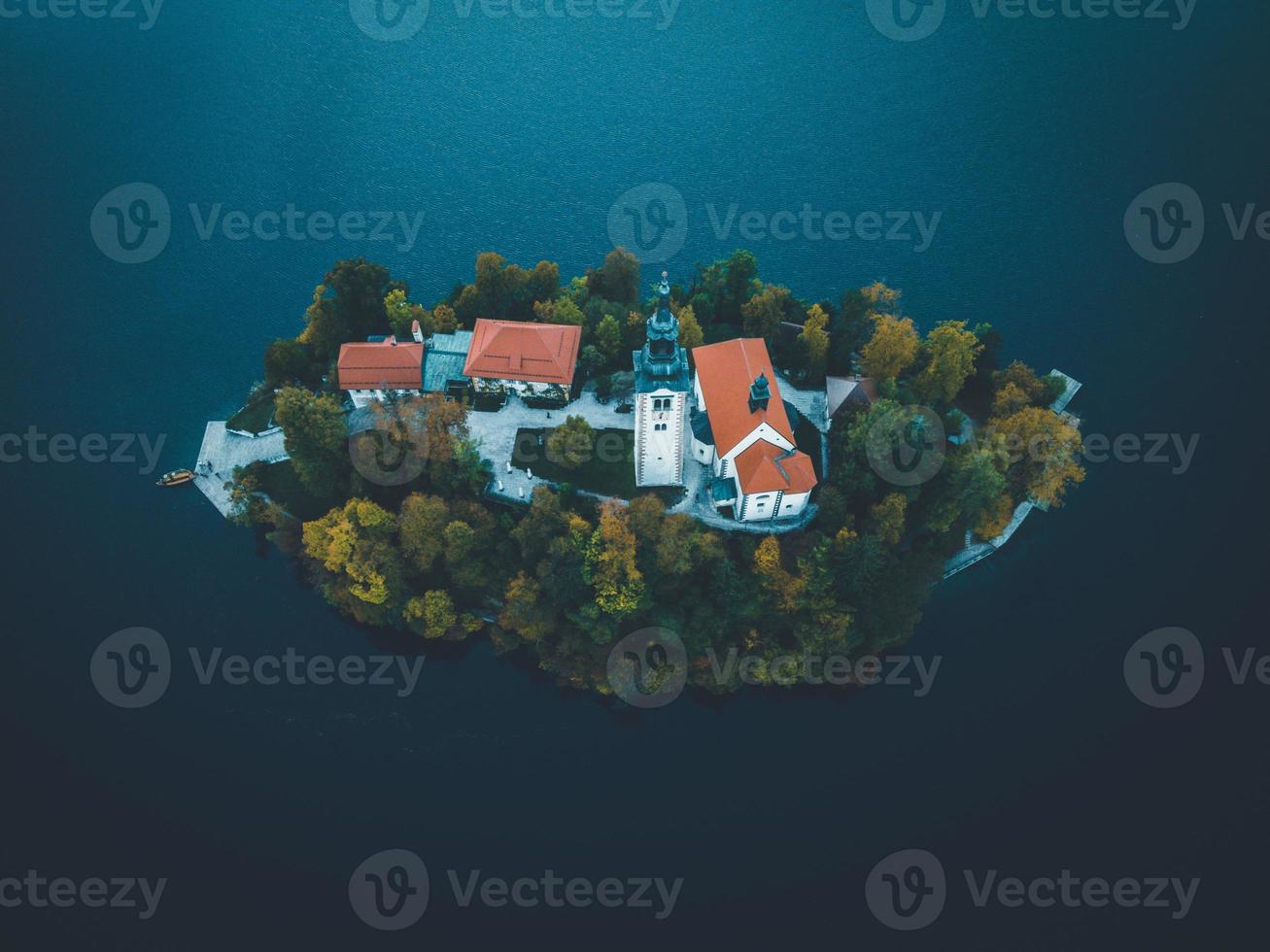 Drone views of the Pilgrimage Church of the Assumption of Maria in Bled, Slovenia photo