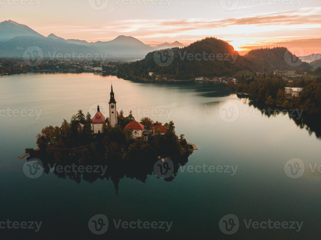 Drone views of the Pilgrimage Church of the Assumption of Maria in Bled, Slovenia photo