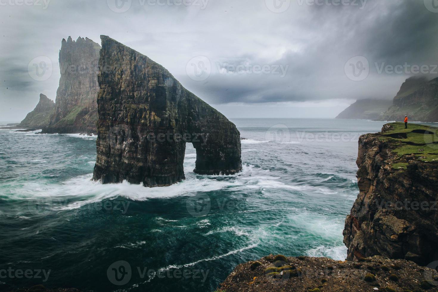 Drangarnir and Tindholmur in the Faroe Islands photo