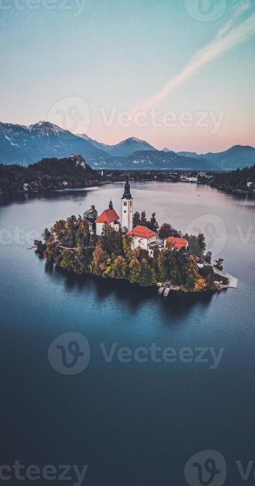 Drone views of the Pilgrimage Church of the Assumption of Maria in Bled, Slovenia photo