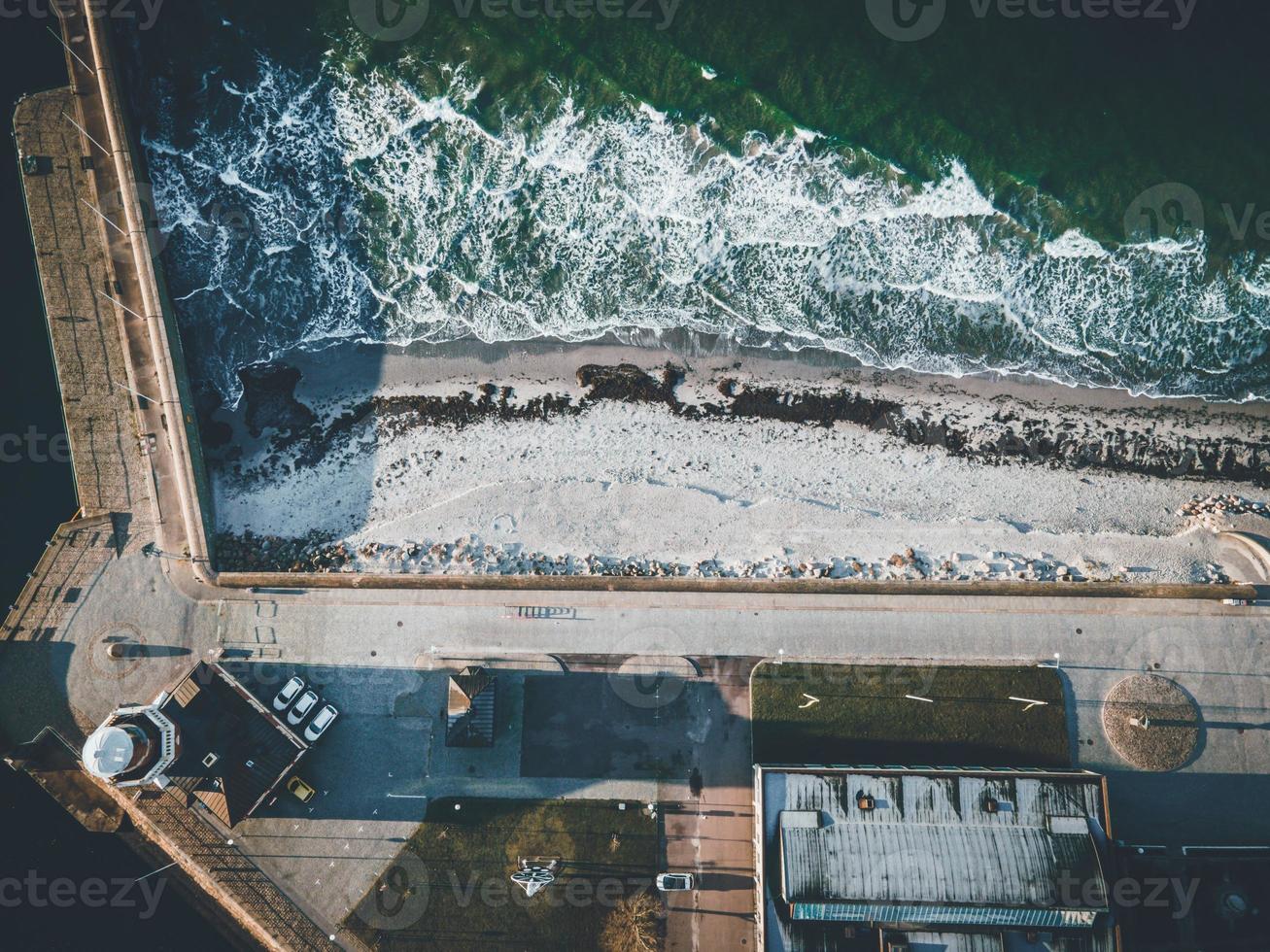 Lighthouse on the coastline in Helsinborg, Sweden photo