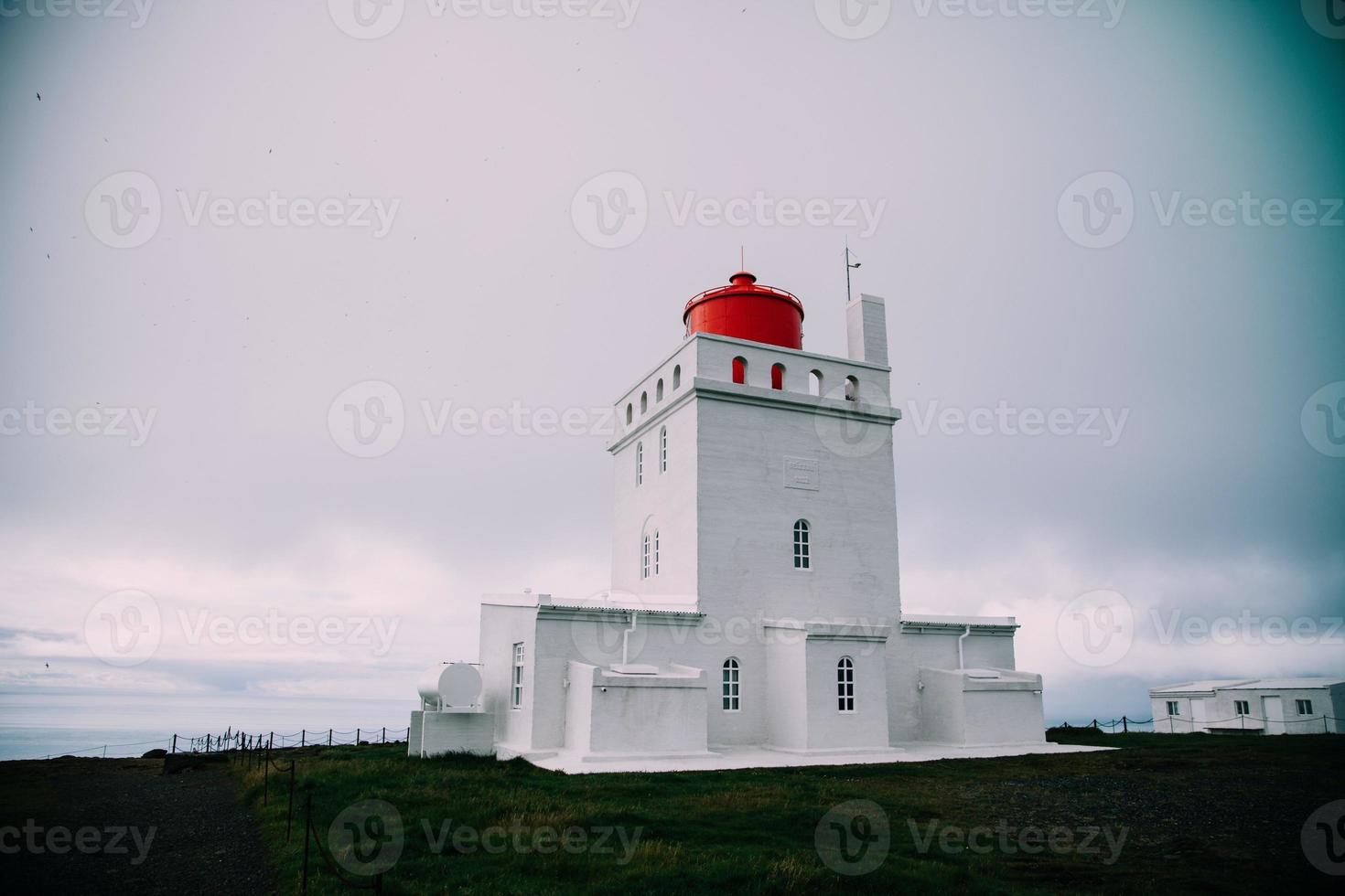 Dyrholaey Lighthouse on the South Coast of Iceland photo