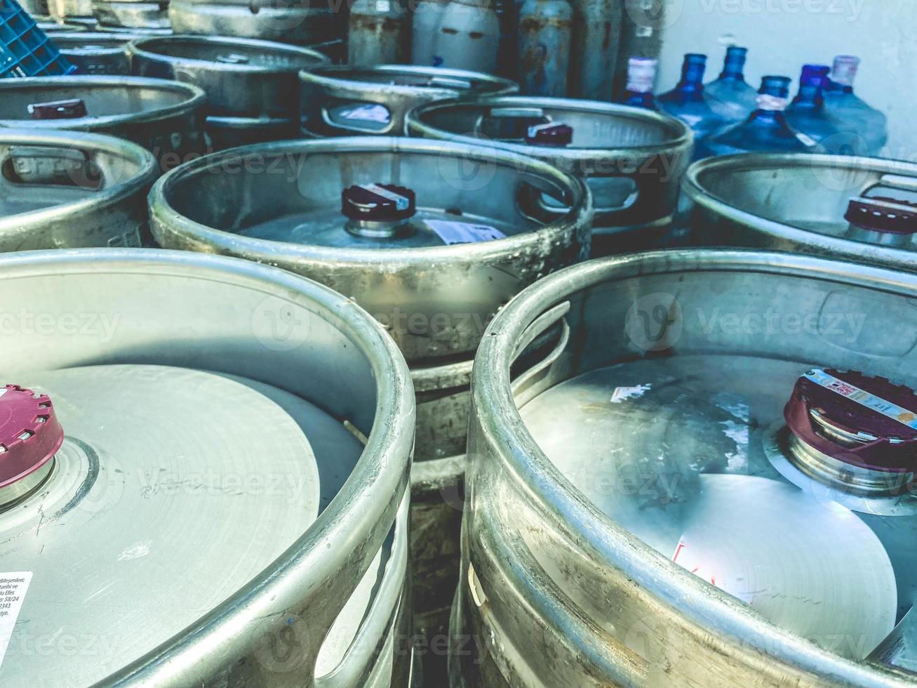 Stacked Barrels of Beer, metal pub kegs. photo