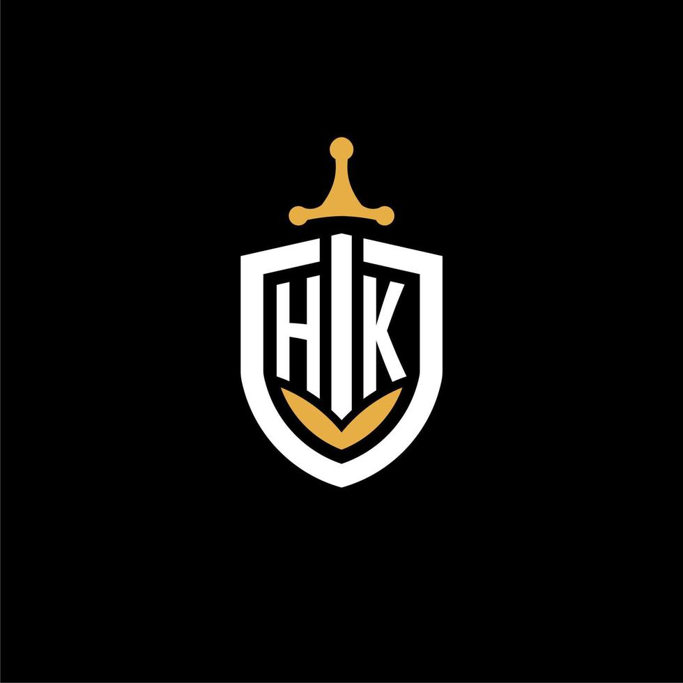 creative letter hk logo gaming esport con ideas de diseño de escudo y espada vector