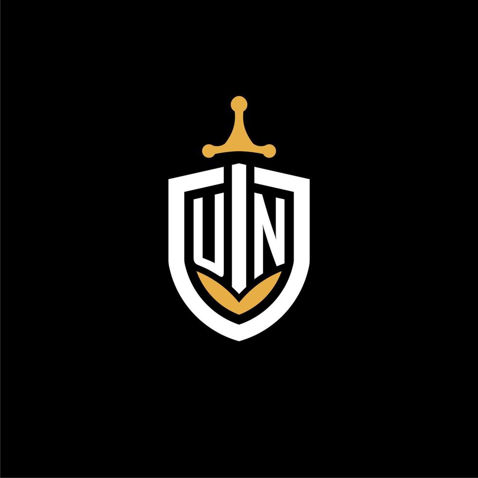 Creative letter UN logo gaming esport with shield and sword design ideas vector