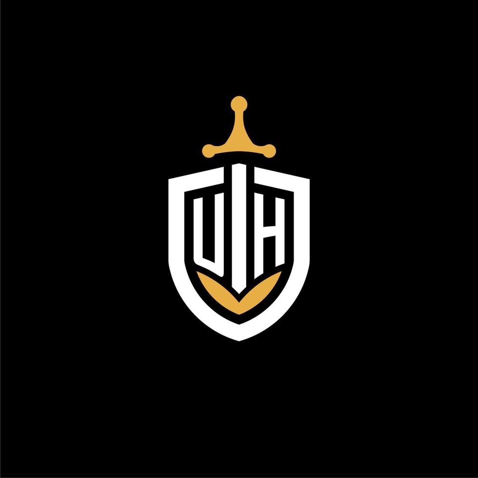 Creative letter uh logo gaming esport con ideas de diseño de escudo y espada vector