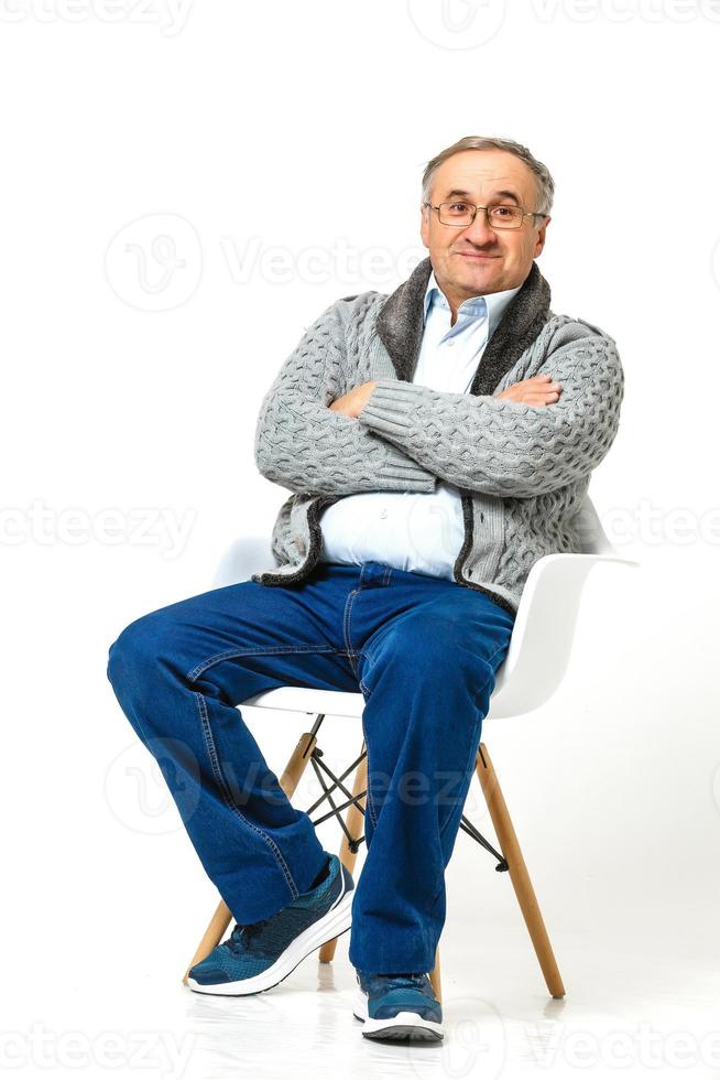 Smiling happy elderly man. Isolated over white background photo