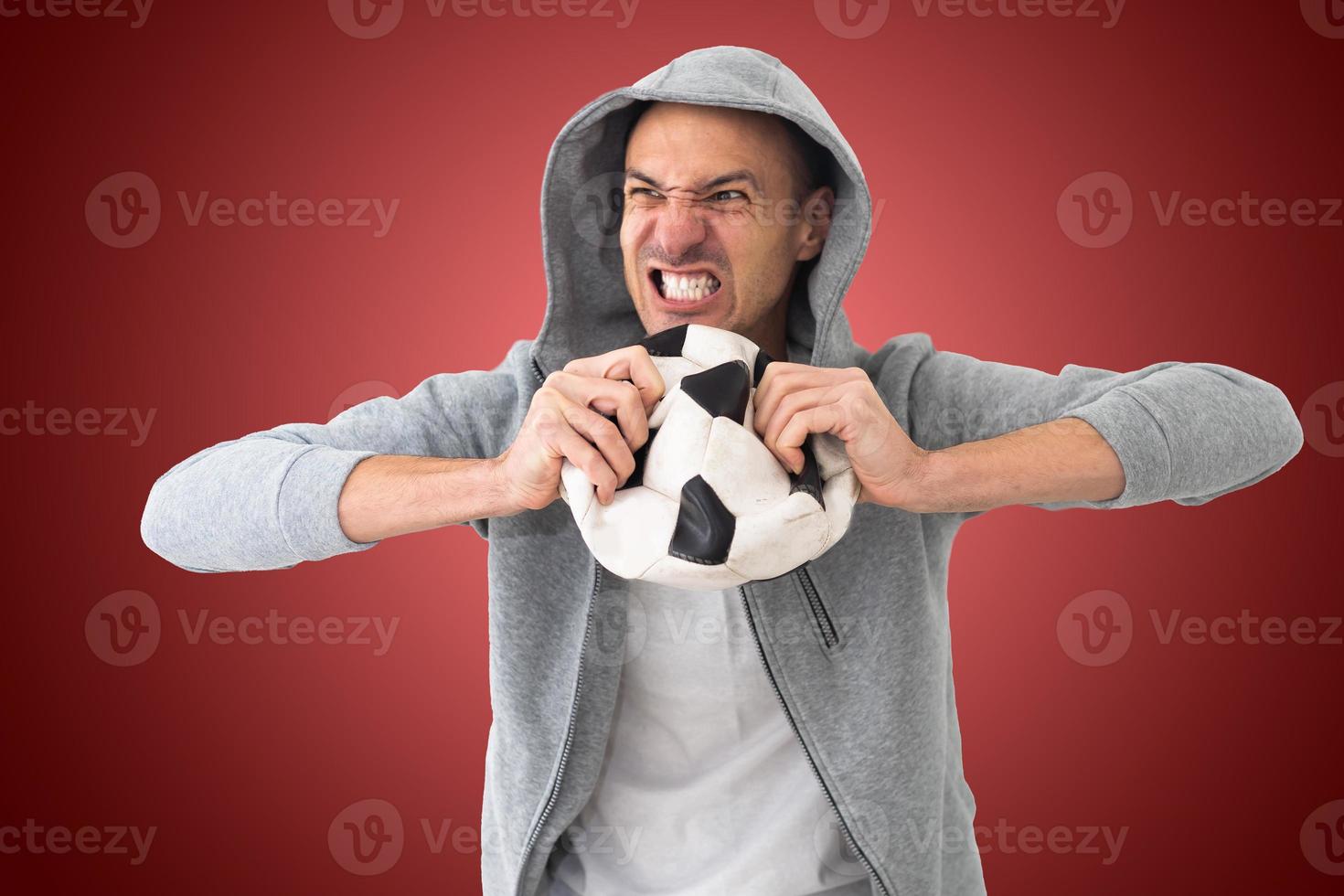 football fan with a deformed ball photo