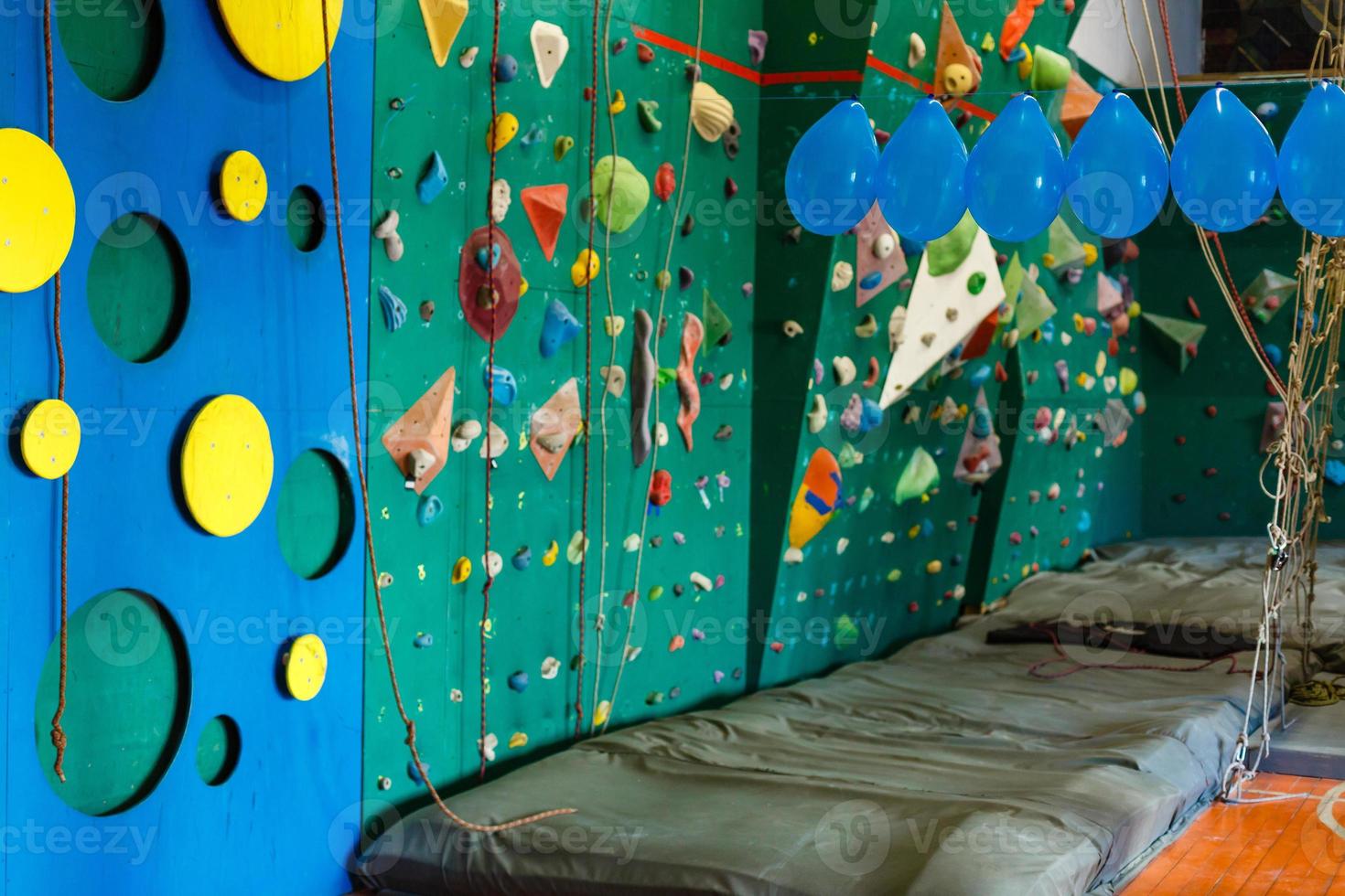 Climbing gym. Colorful footholds for training photo