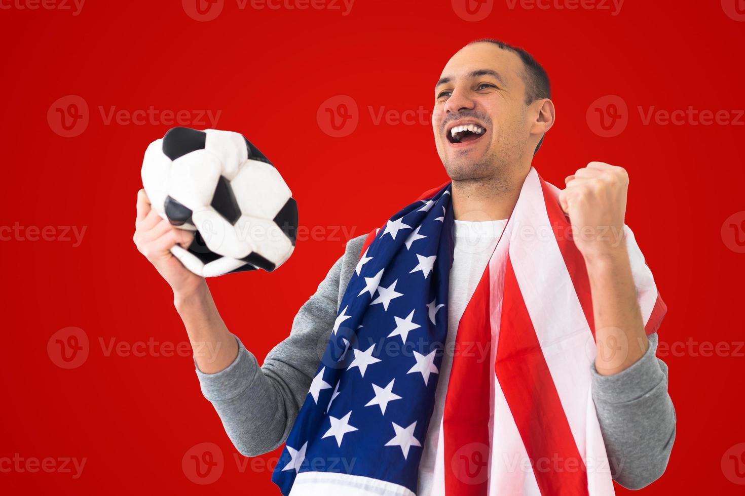 football fan with a deformed crumpled ball and an American flag photo