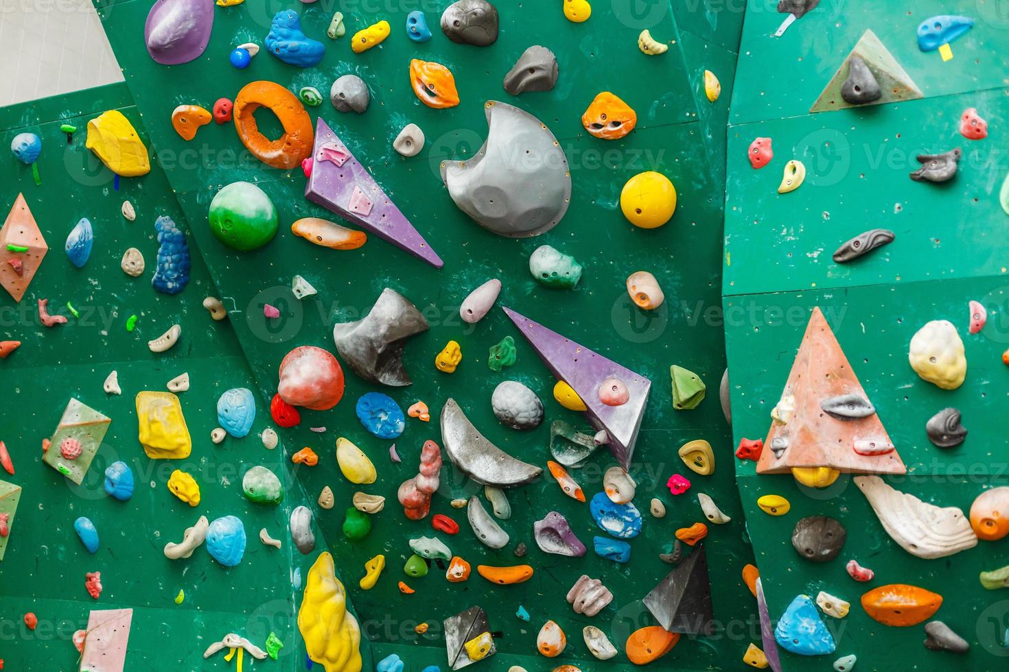 Climbing gym. Colorful footholds for training photo