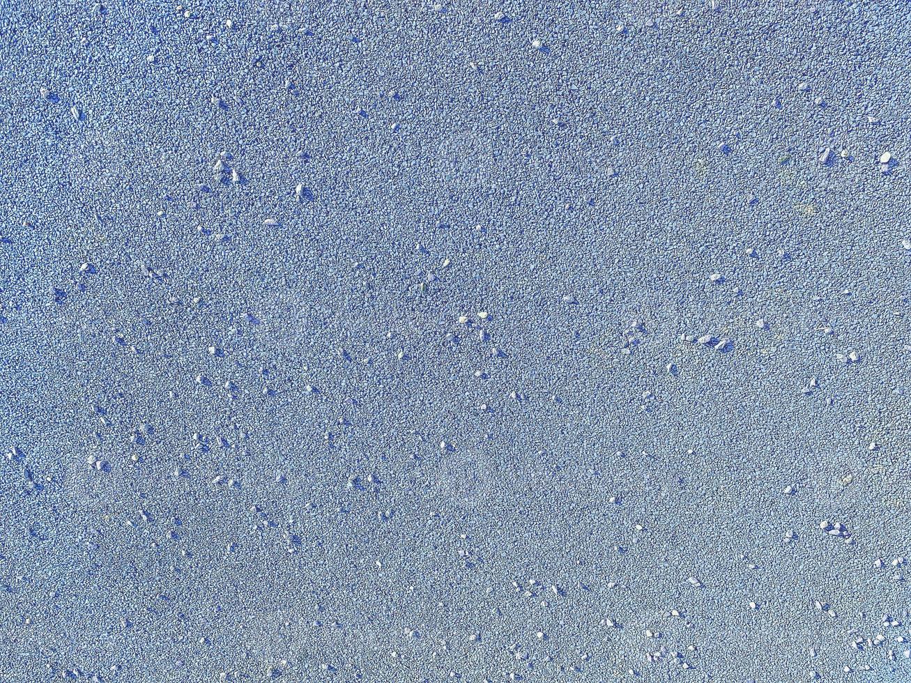 Rubber floor blue texture background. Granules playground cover