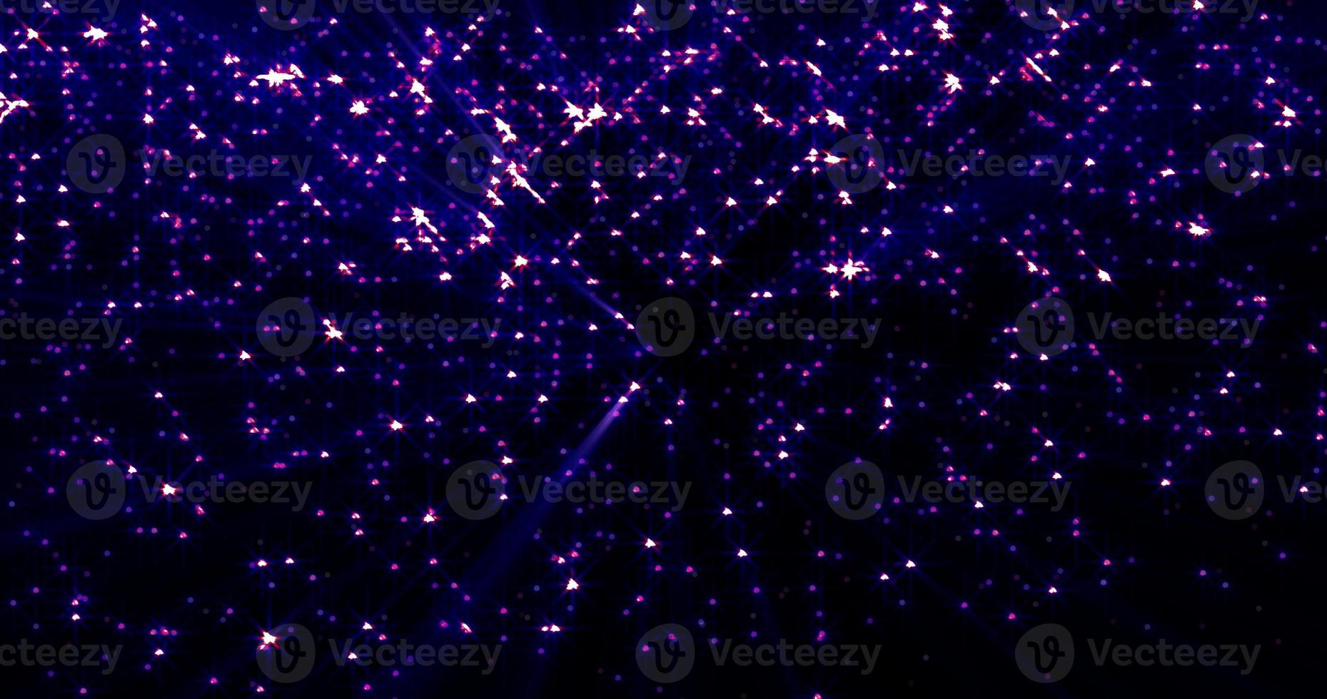 Bright luminous shiny purple beautiful mysterious rhinestone star particles on a black background. Abstract background, intro photo