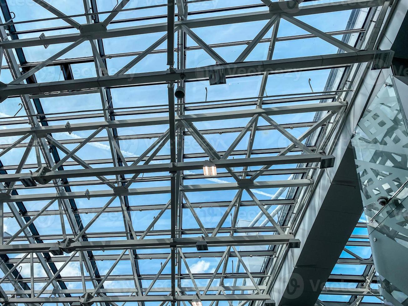 ceiling in a glass building on metal supports. glass ceiling, modern
