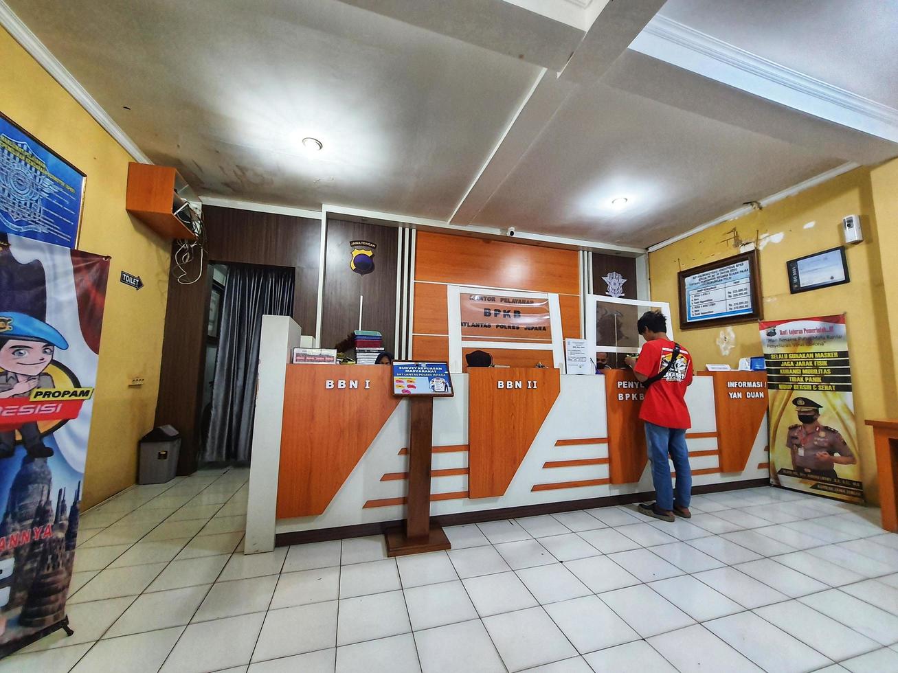 Central Java, Indonesia in October 2022. Several people are queuing and waiting at the BPKB service office or vehicle certificate of ownership at the Jepara Police photo