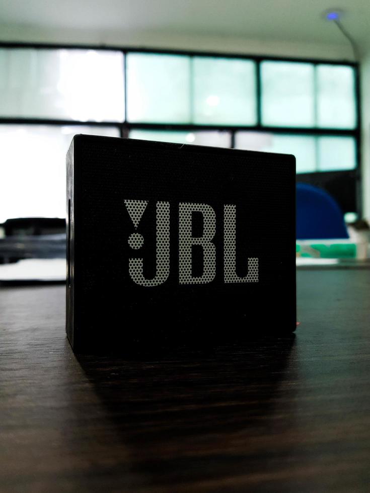 Jakarta, Indonesia in July 2022. A mini JBL brand speaker in an office, photo