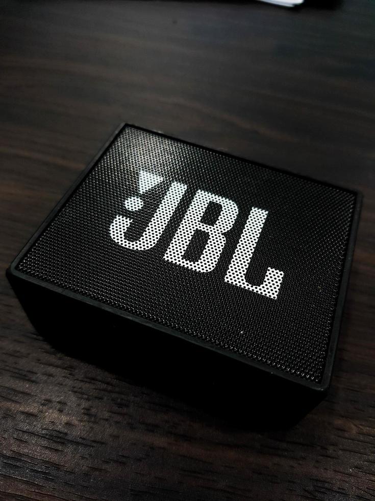 Jakarta, Indonesia in July 2022. A mini JBL brand speaker in an office, photo