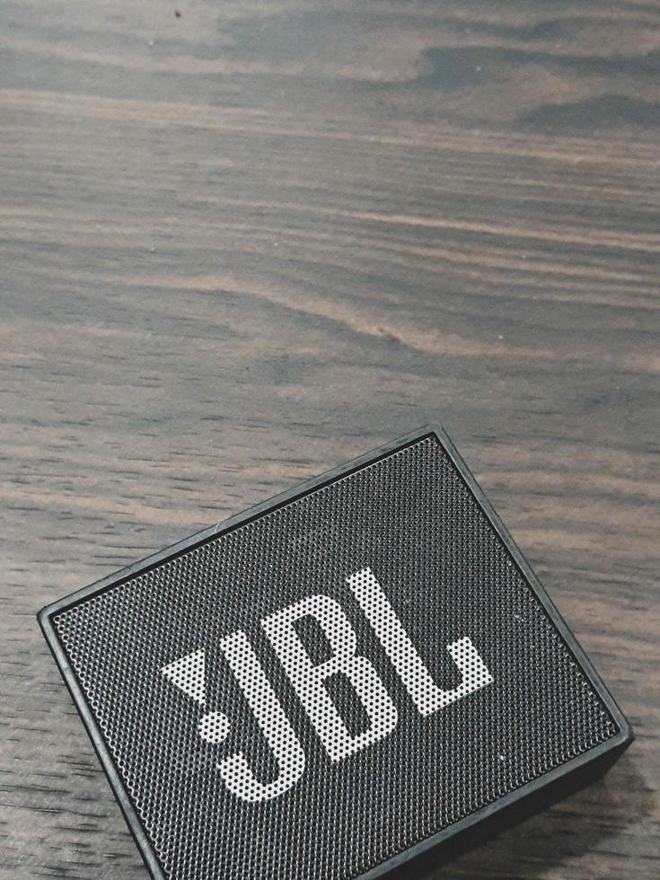 Jakarta, Indonesia in July 2022. A mini JBL brand speaker in an office, photo