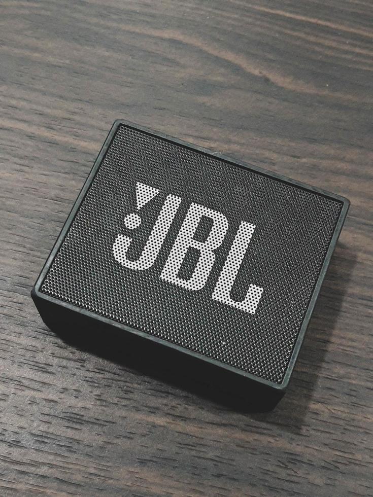 Jakarta, Indonesia in July 2022. A mini JBL brand speaker in an office, photo
