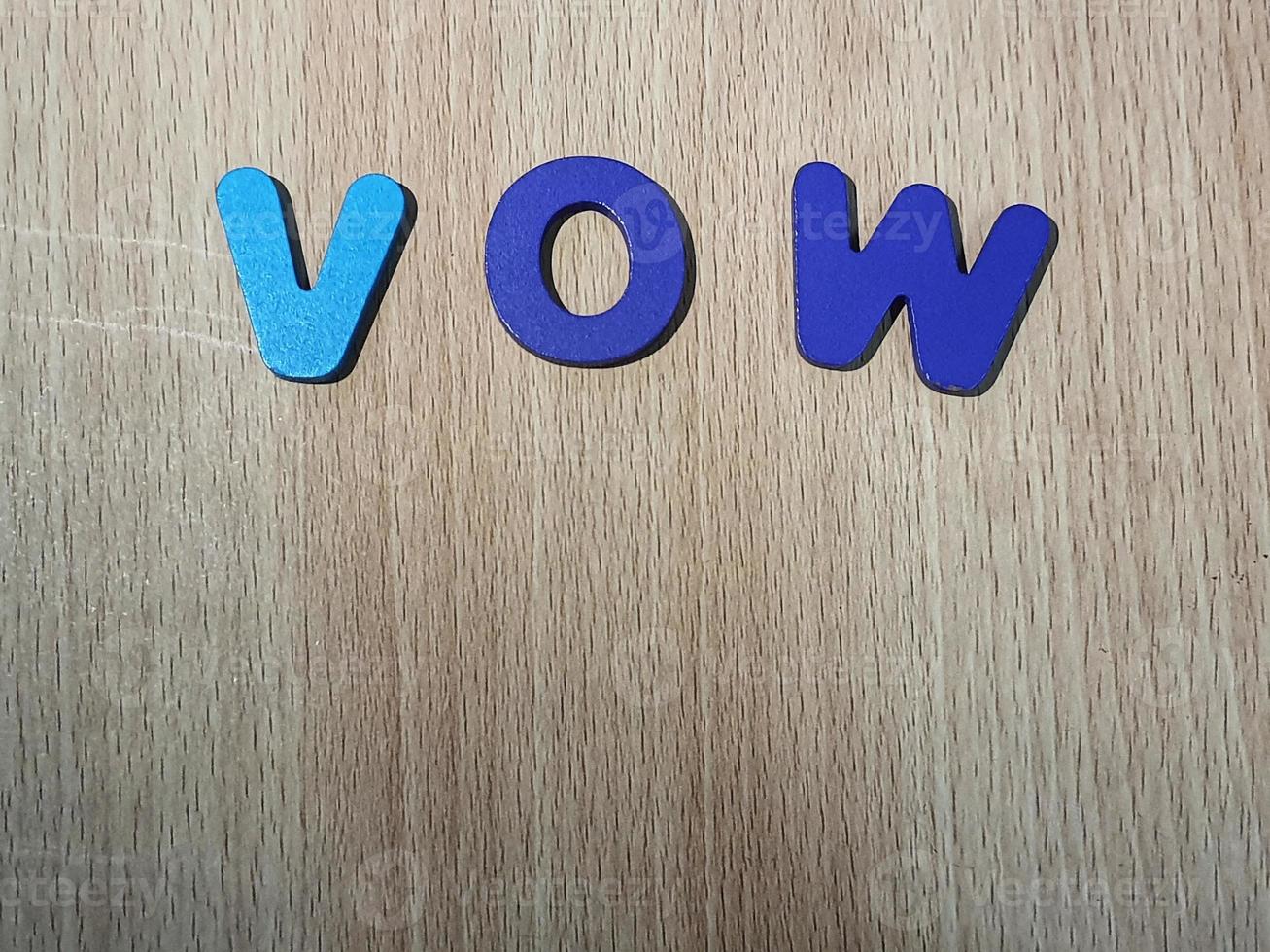 The arrangement of blue letters that read VOW photo