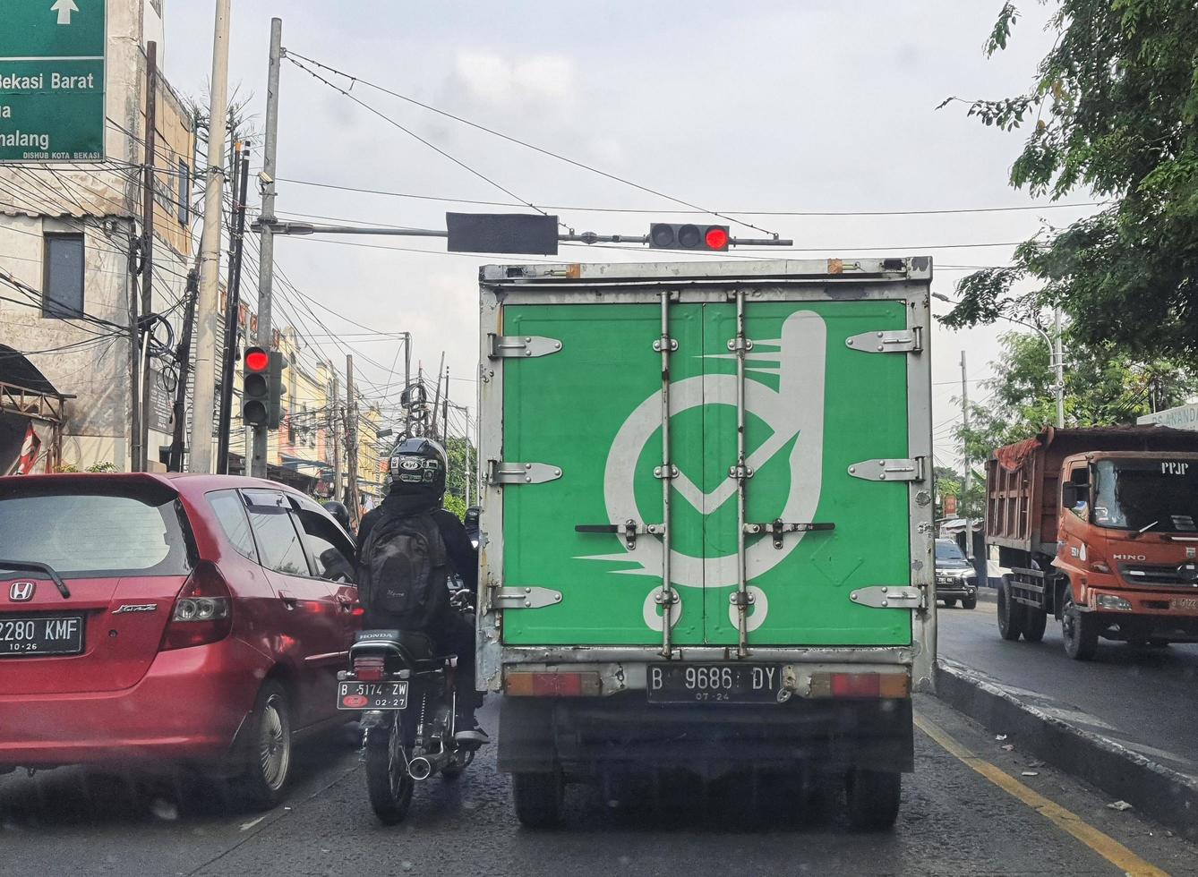 Jakarta, Indonesia in September 2022. Rear view of an ankle box car for Fast Delivery in the Greater Jakarta Area owned by Deliveree, photo