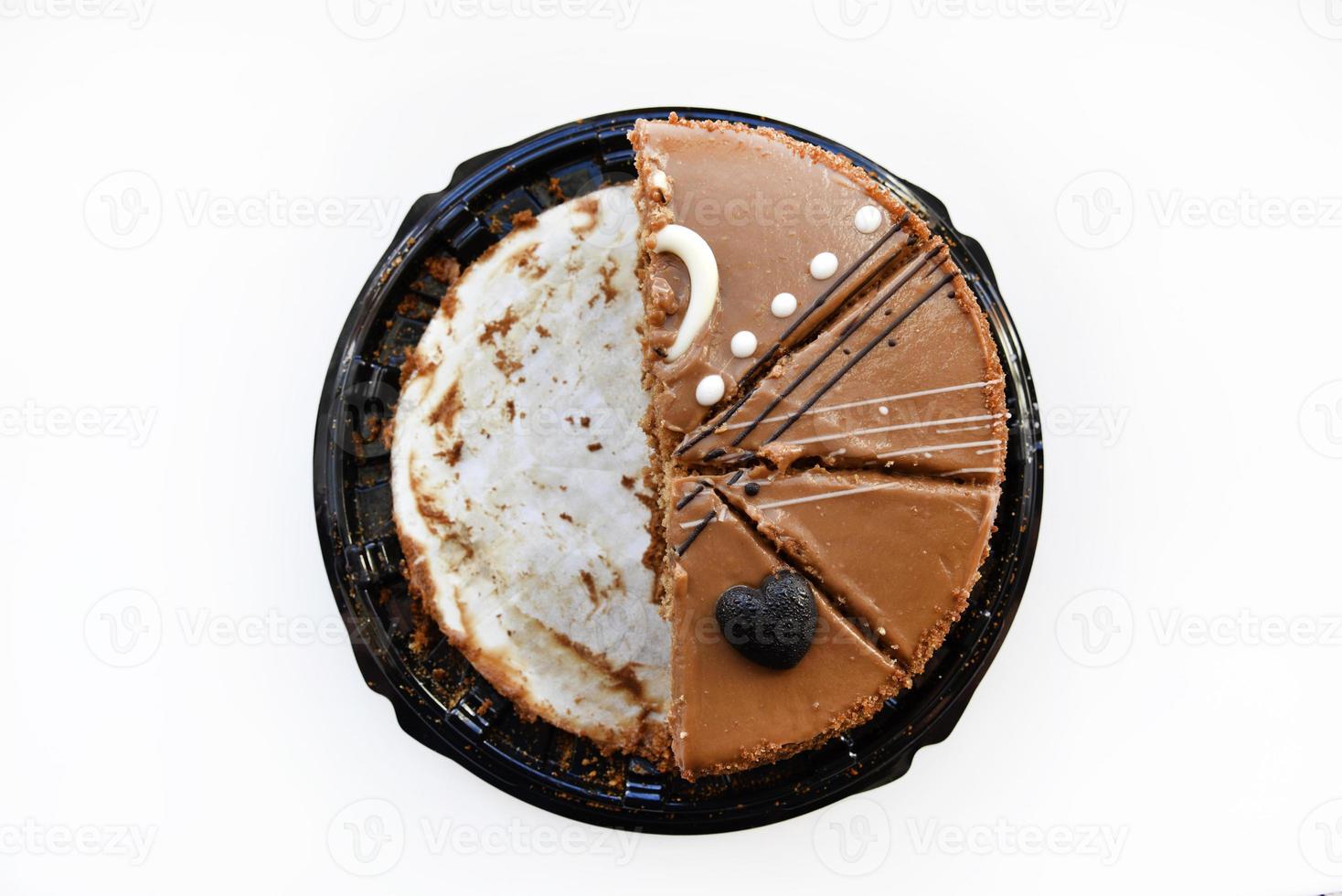 Delicious honey cake close-up. Sliced sweet cake on a white background. Slices of honey cake for the holiday. photo