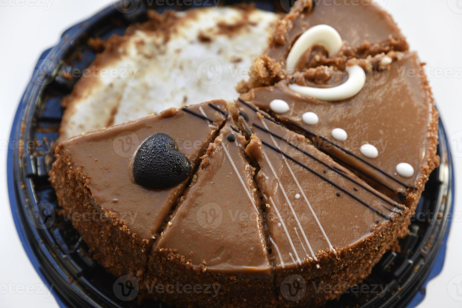 Delicious honey cake close-up. Sliced sweet cake on a white background. Slices of honey cake for the holiday. photo