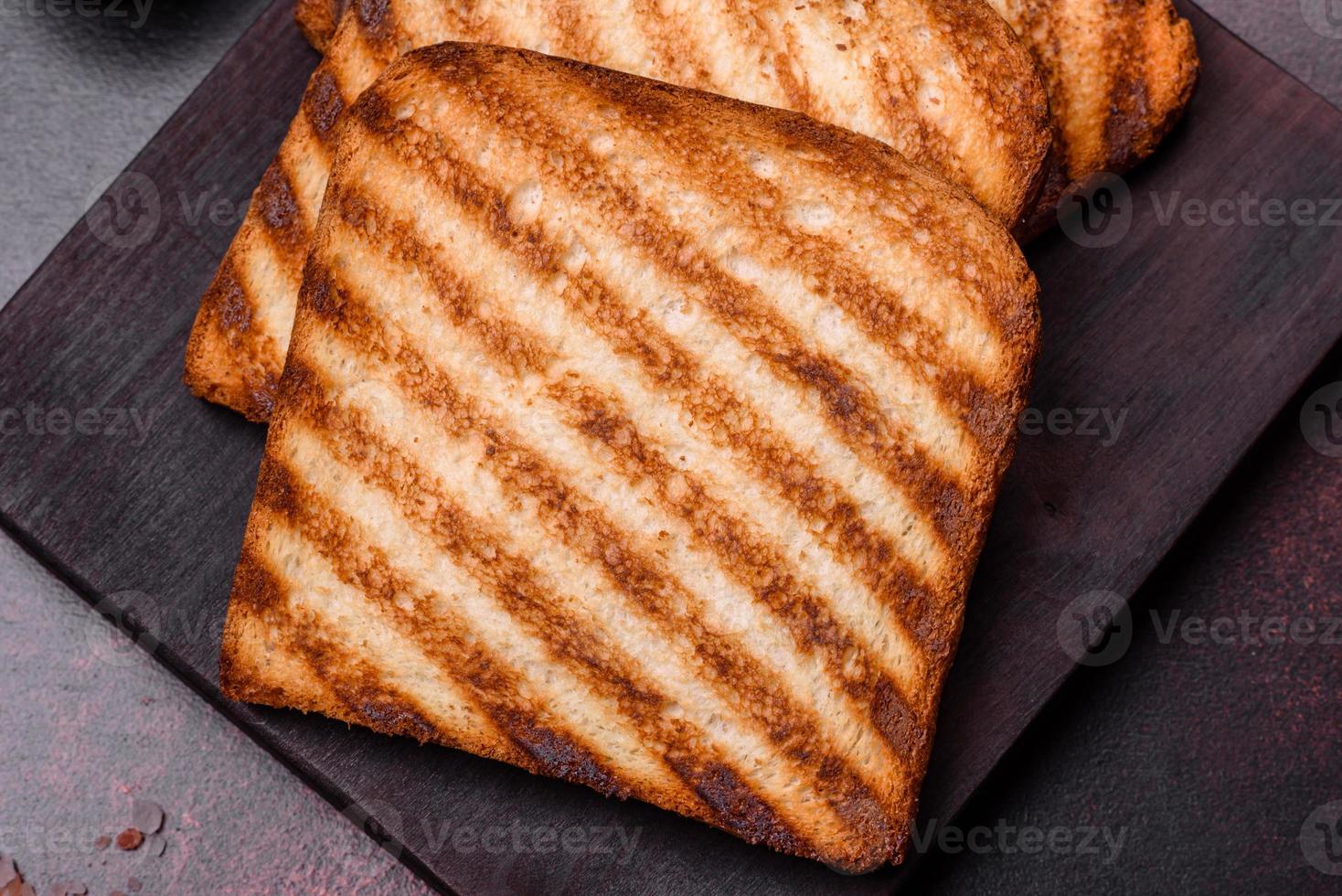 Tasty fresh crispy bread slices in the form of grilled toast photo