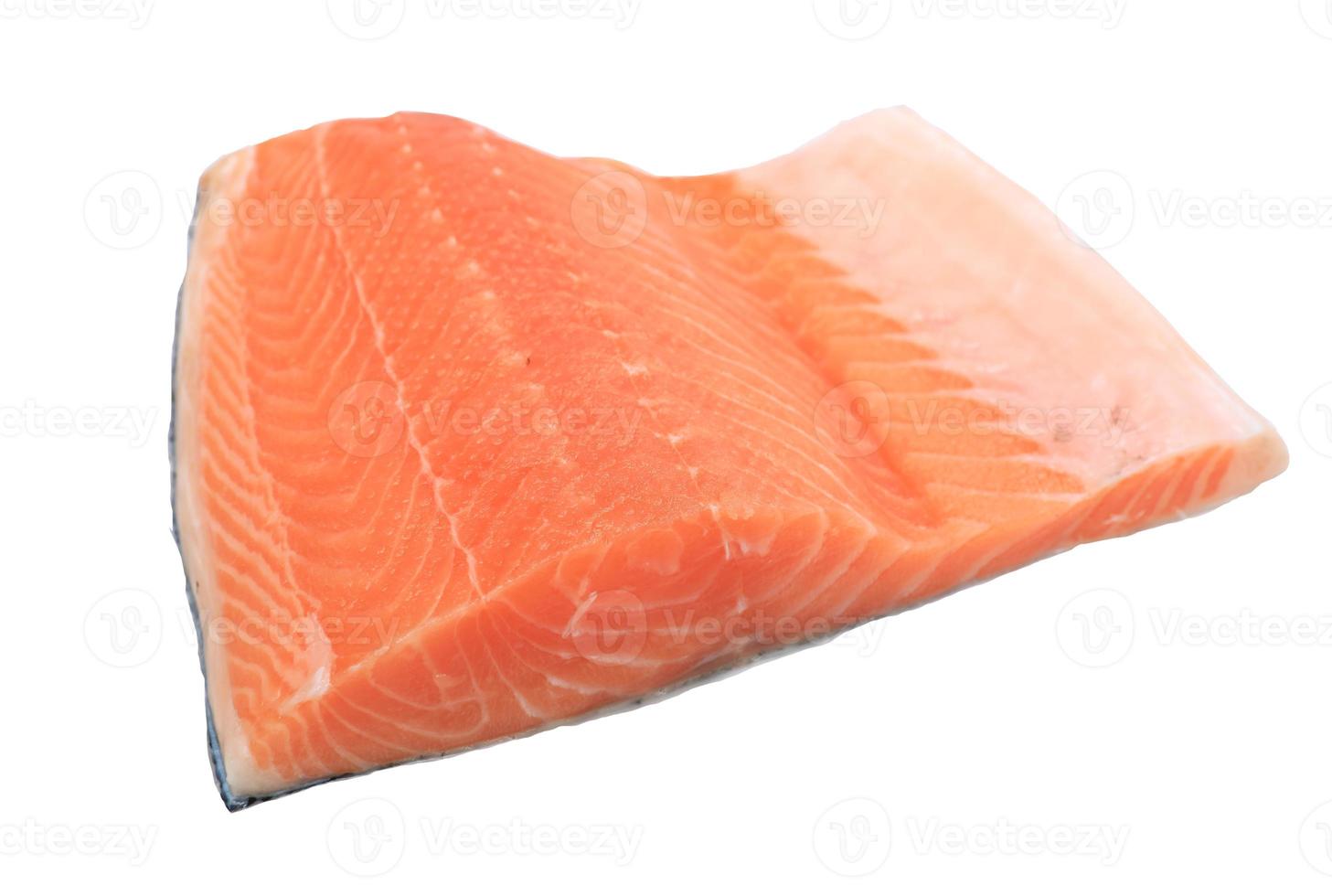 Raw salmon fillet isolated on white background photo