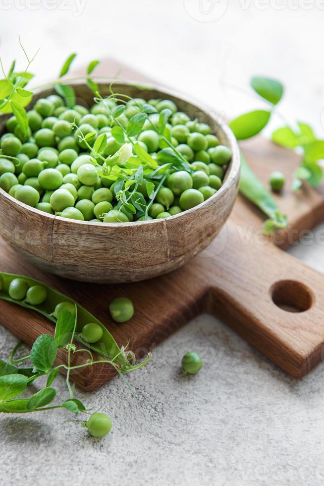 Bowl with sweet pea pods photo