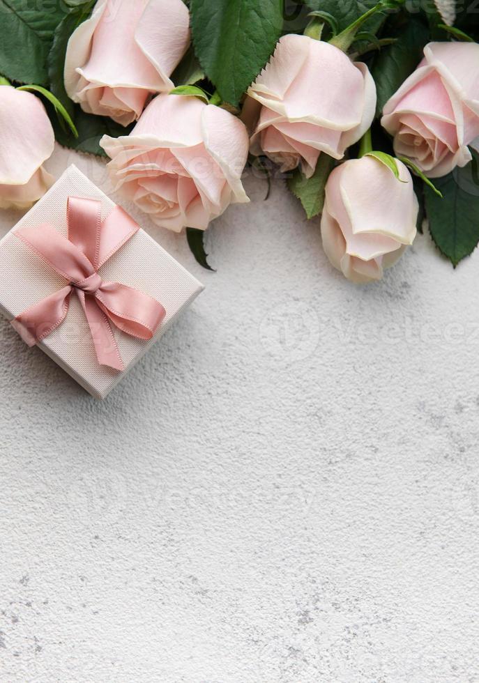 Pink pastel roses with gift box photo