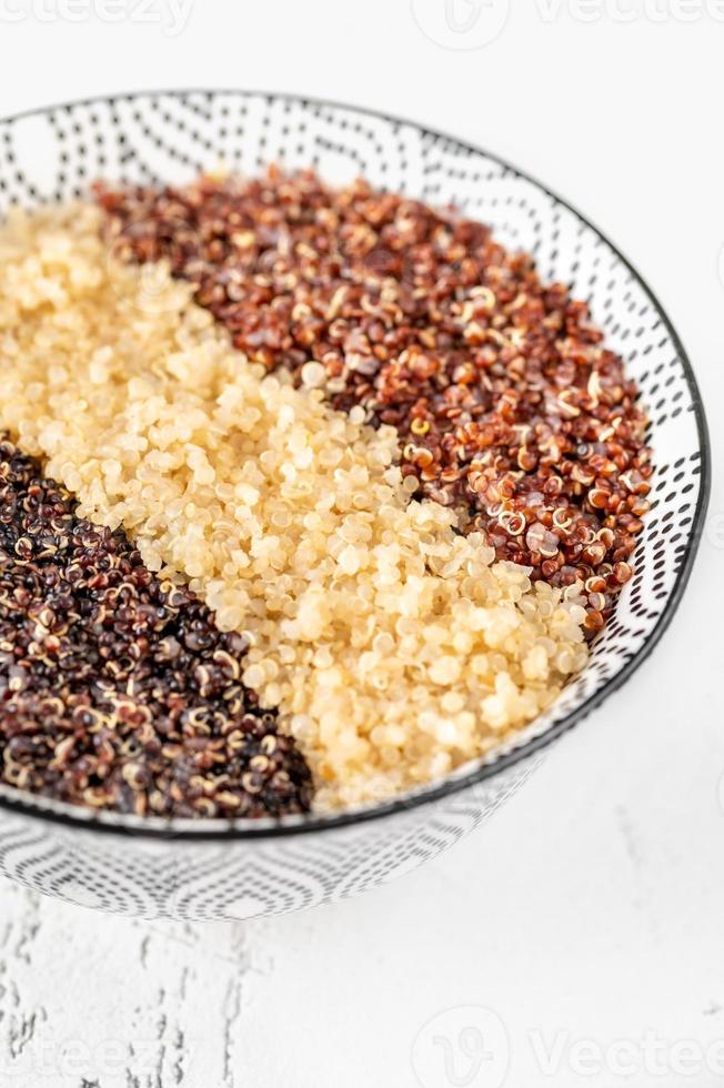 Bowl of  cooked quinoa photo