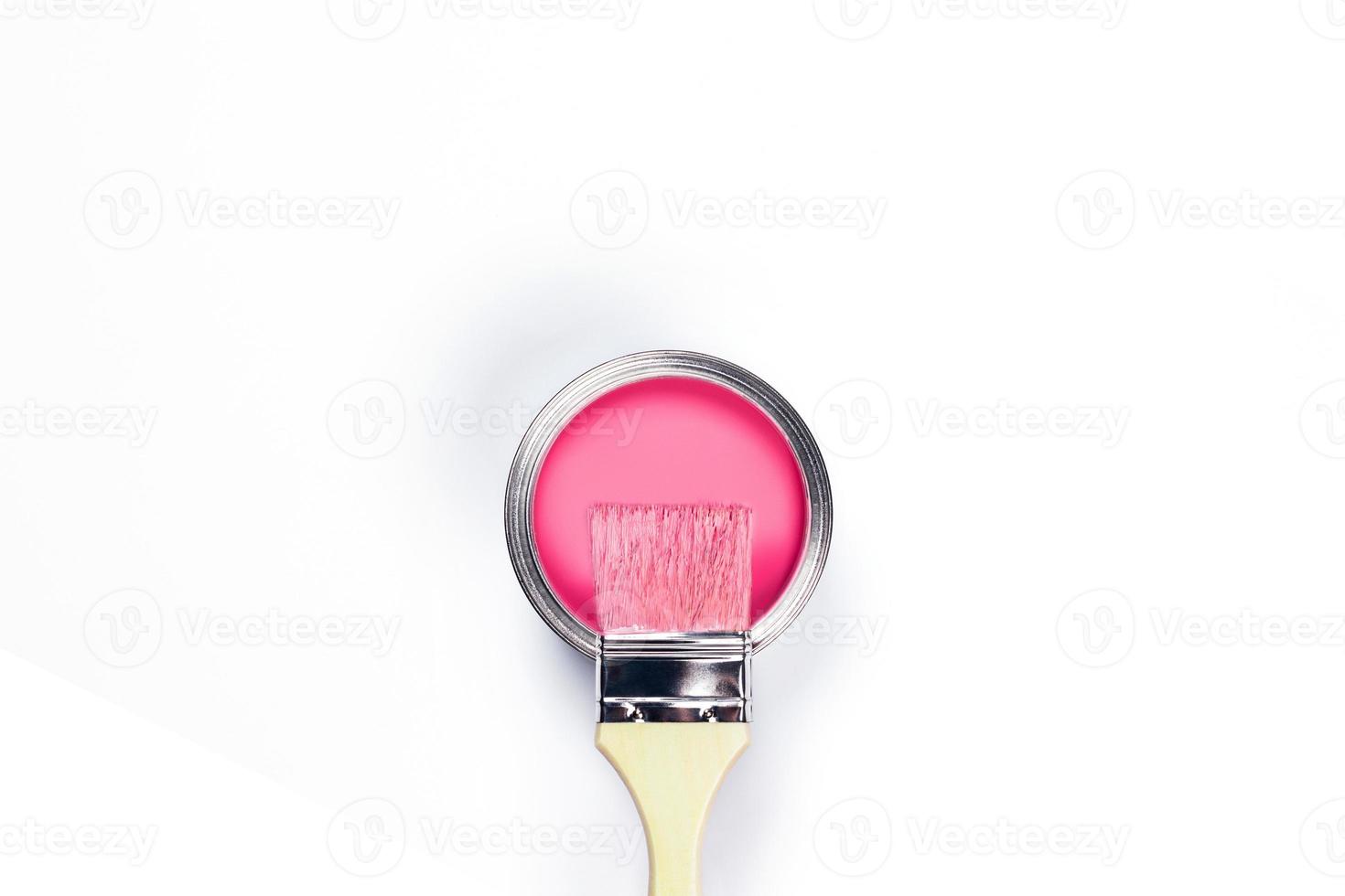 White background with pink paint jar. photo