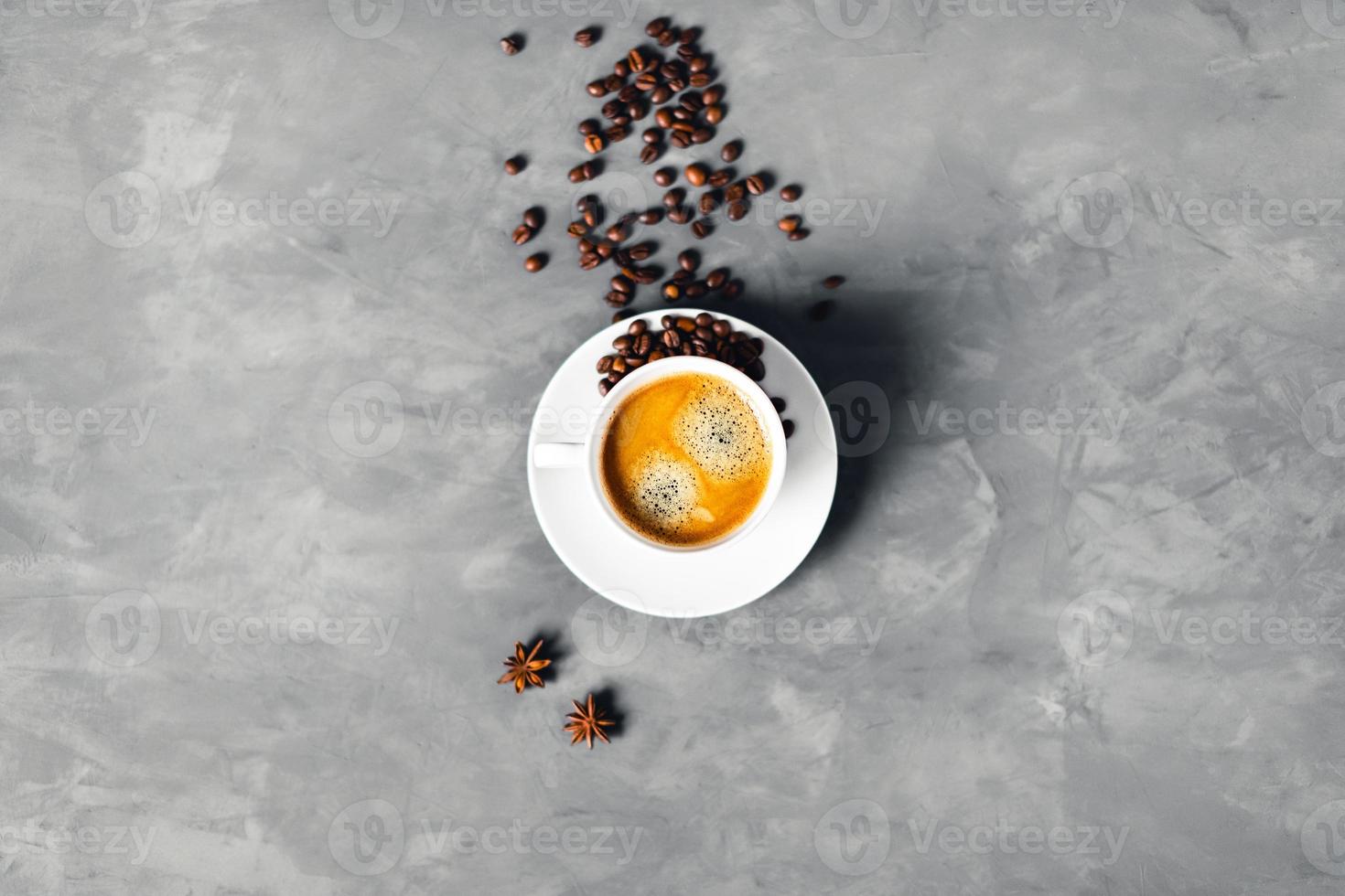 One cup of coffee on gray background. photo