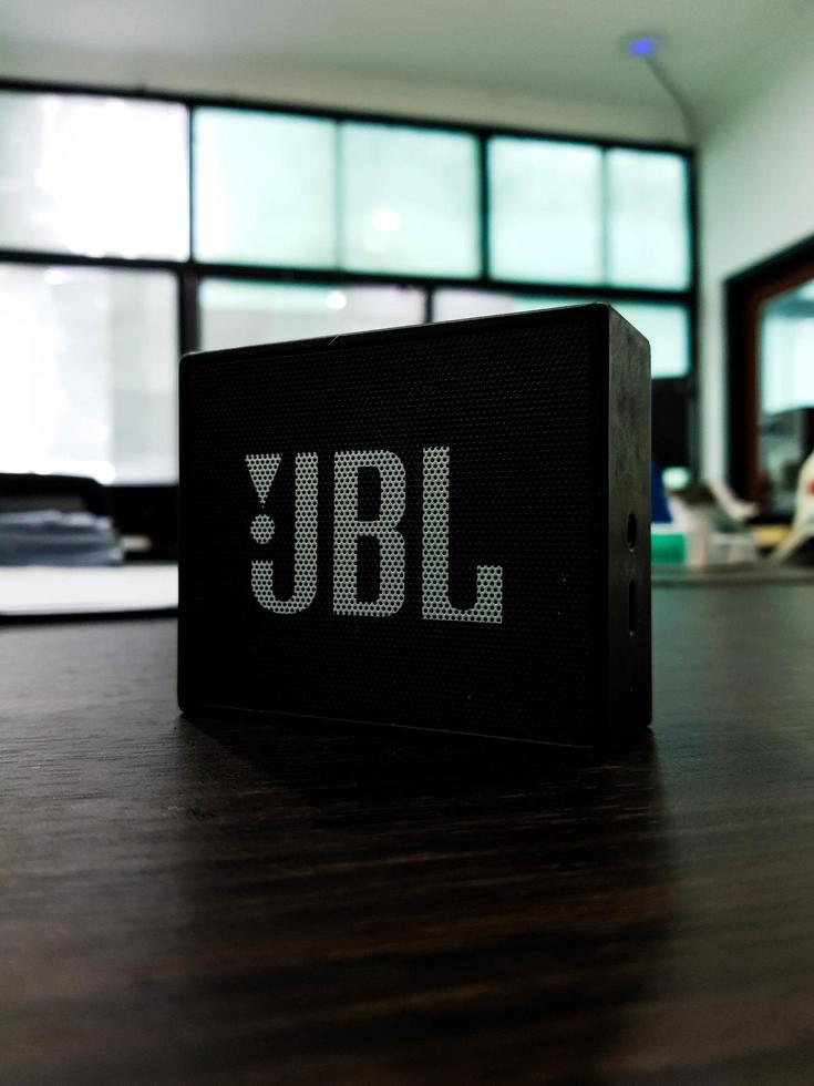 Jakarta, Indonesia in July 2022. A mini JBL brand speaker in an office, photo