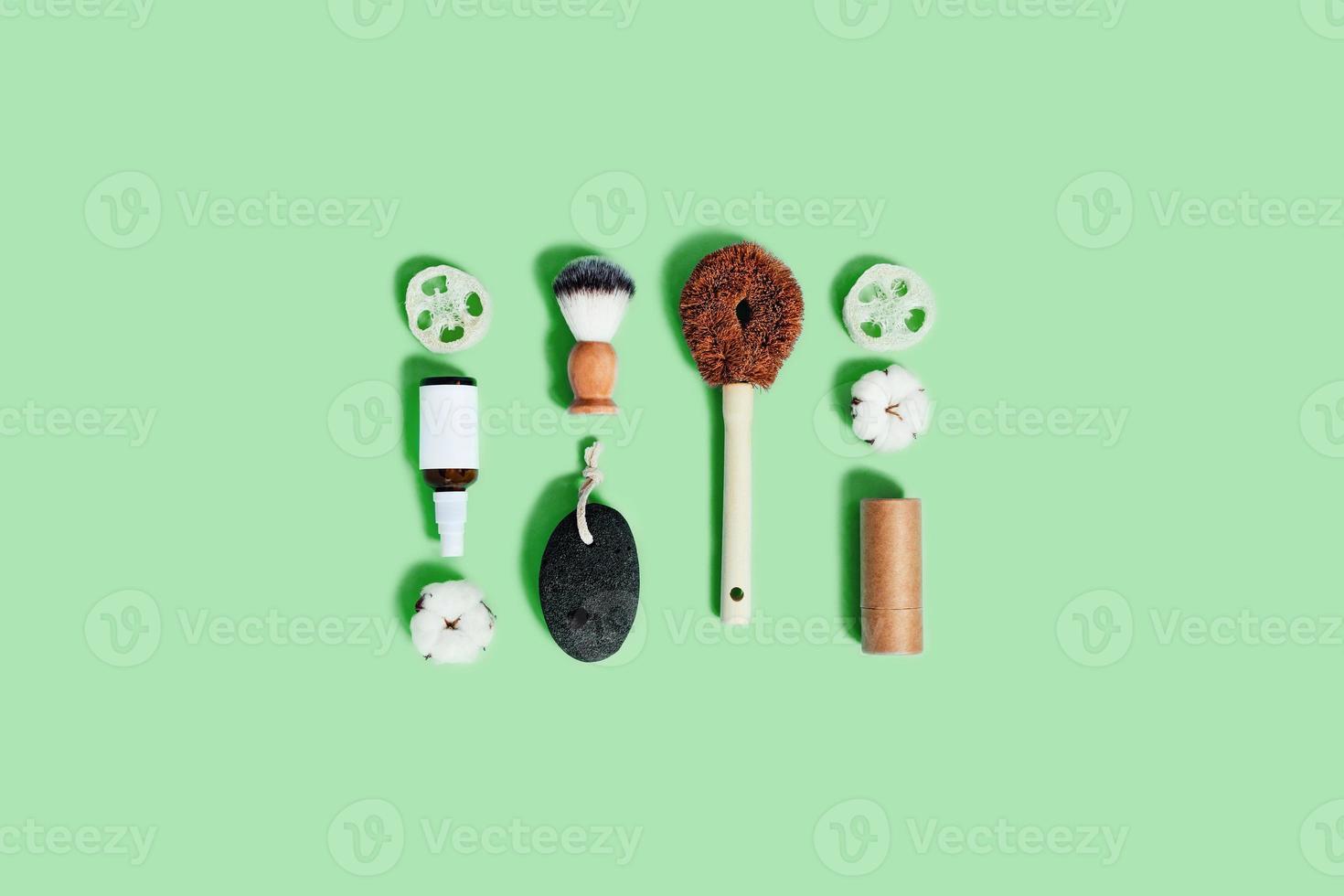 Zero waste accessories on mint green background. photo