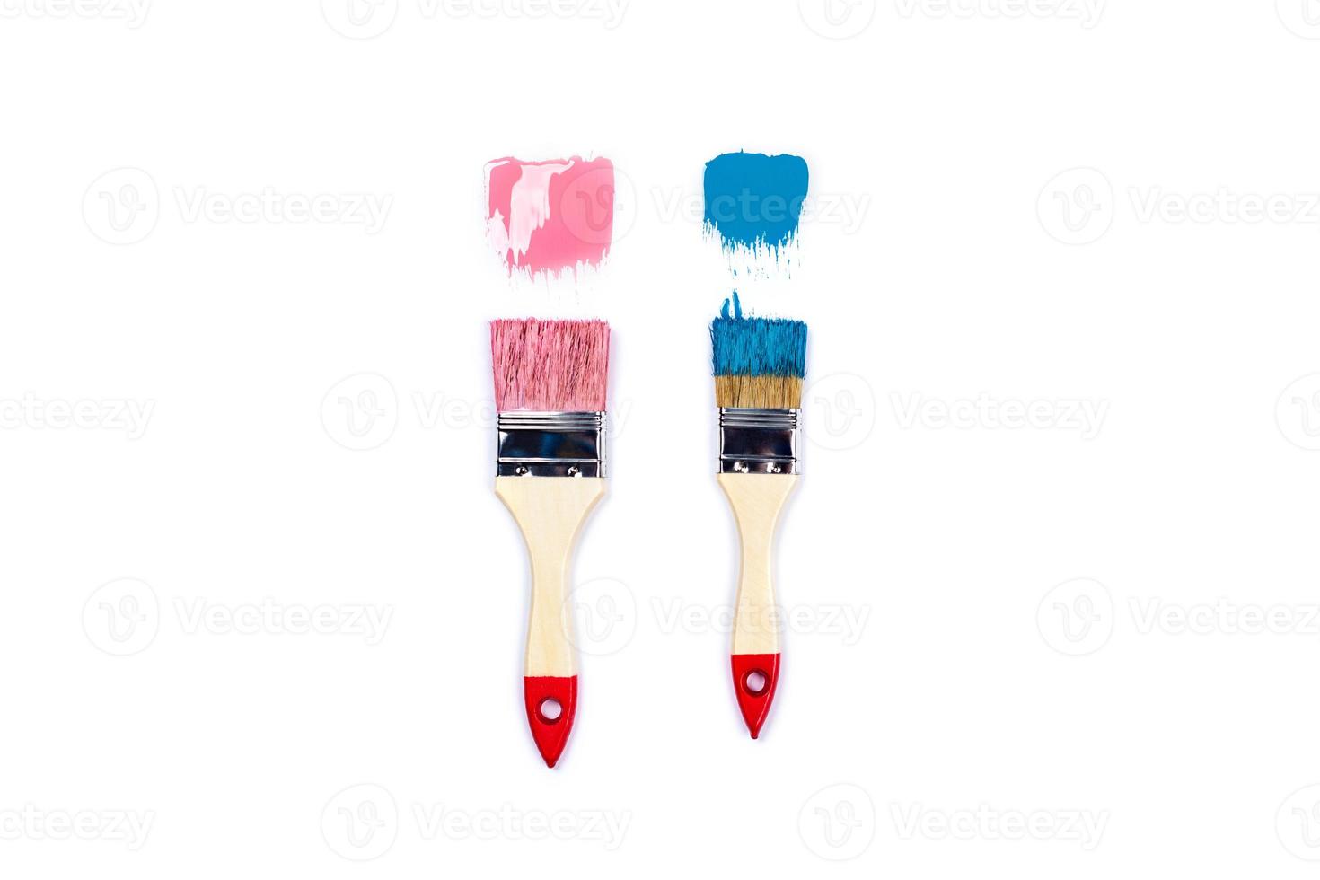 White background with two paint jars and brushes. photo