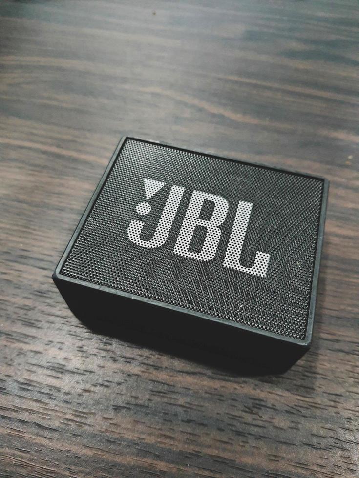Jakarta, Indonesia in July 2022. A mini JBL brand speaker in an office, photo