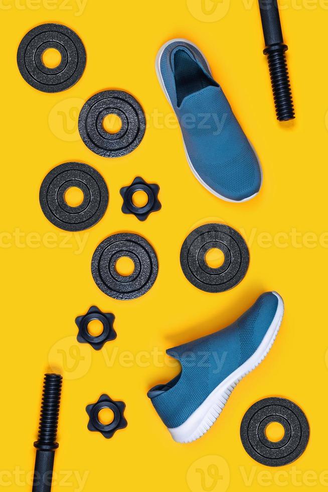 Sports flatlay. Sneakers and kettlebells. photo