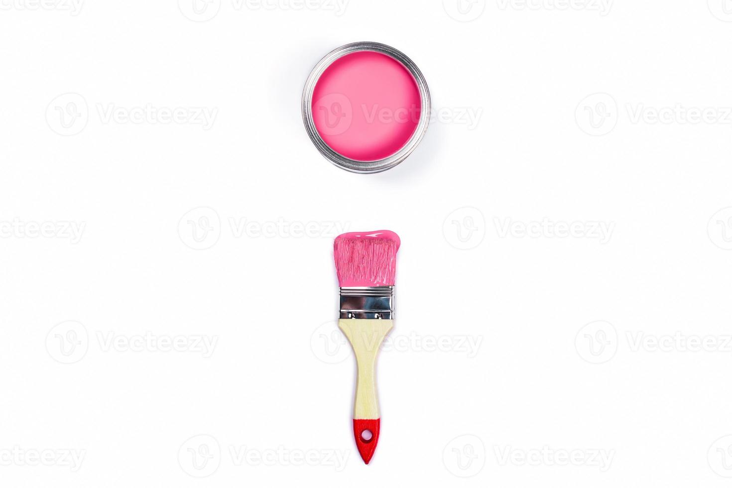 White background with one colored paint jar and brush. photo