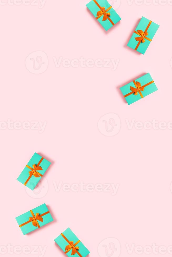 Mint gift box on a pink background. photo