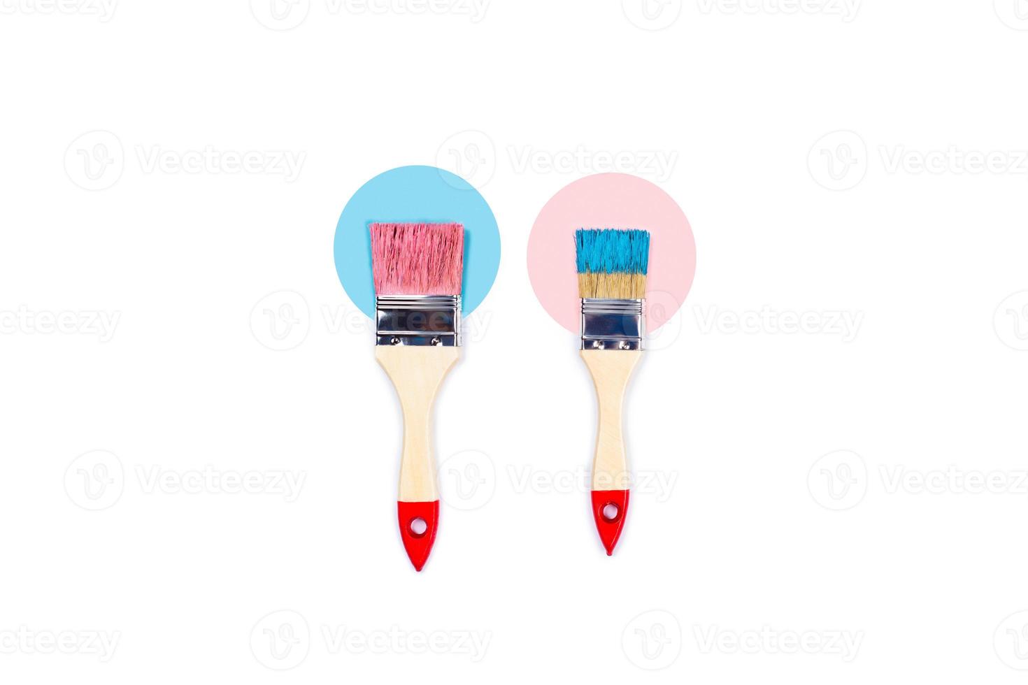 White background with two paint brushes. photo