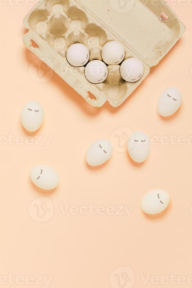 Eggs on a orange background. photo