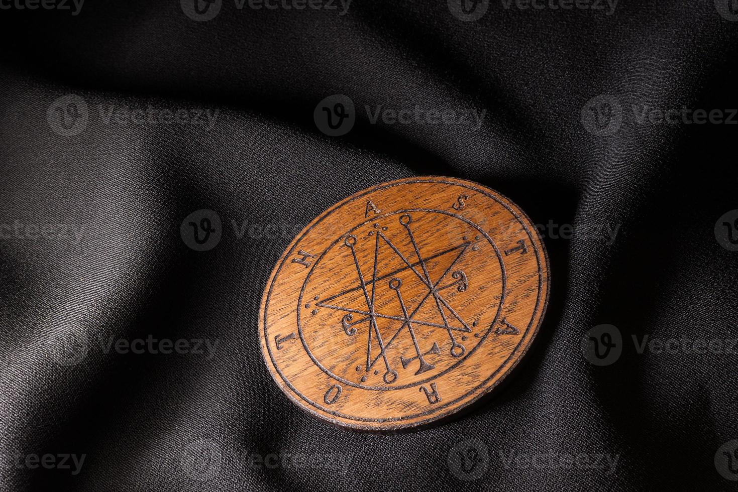 Ouija Board, yellow on a black background photo