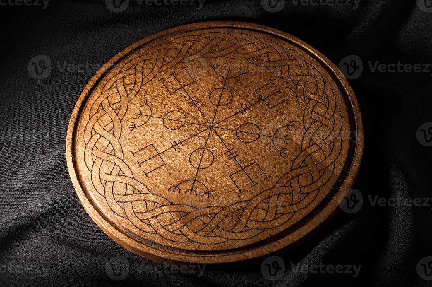 Ouija Board, yellow on a black background photo