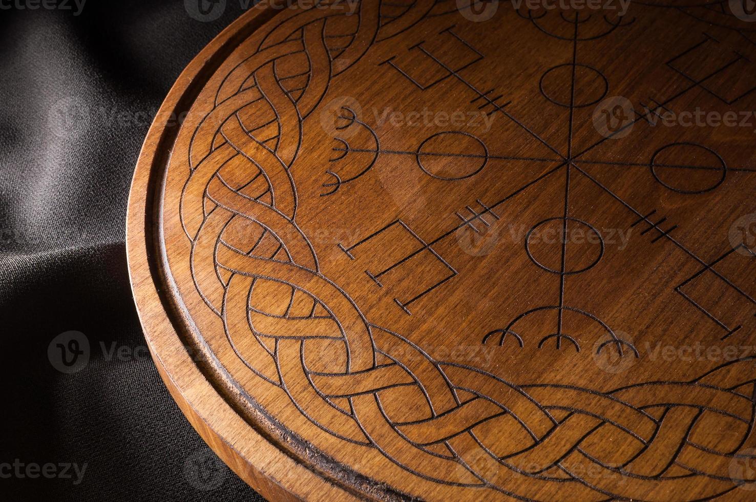 Ouija Board, yellow on a black background photo